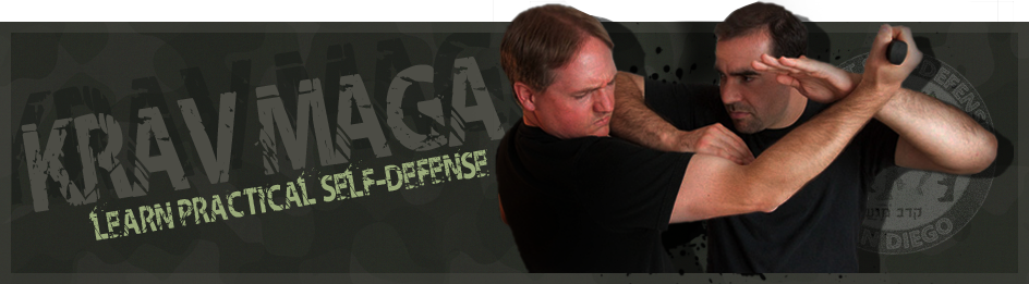 Instructor Yury defending close range knife attack.